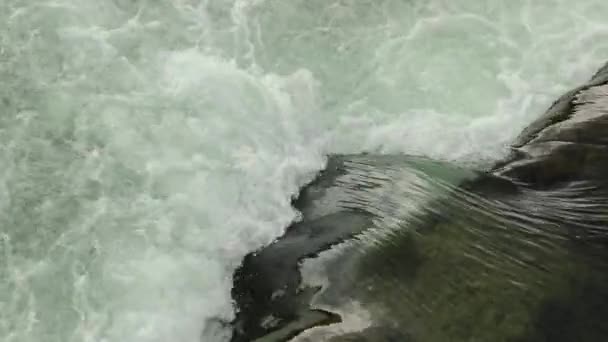 Splashing water current over a dam — Stock Video