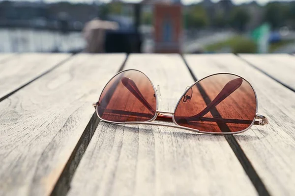 Sunglasses on a table — Stock Photo, Image