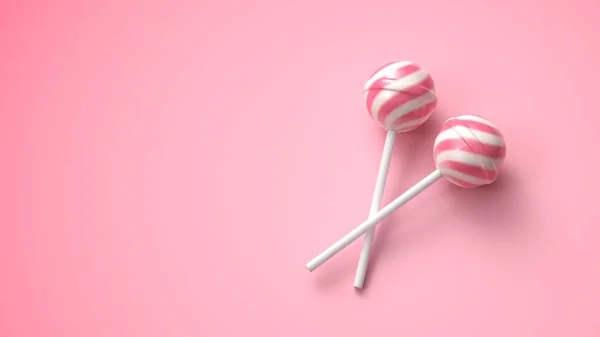 Dos piruletas de rayas dulces de color rosa y blanco en palo sobre fondo rosa brillante — Foto de Stock