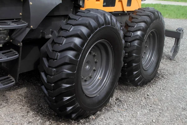 Wheels with a high protector of tractor. — Stock Photo, Image
