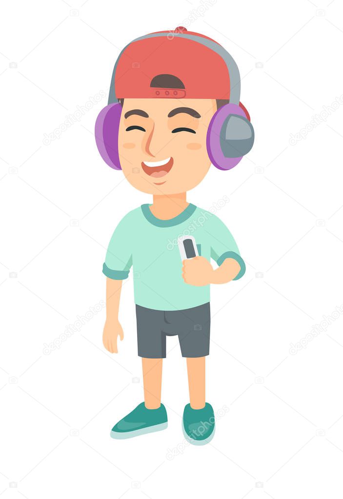 Caucasian boy listening to music in headphones.