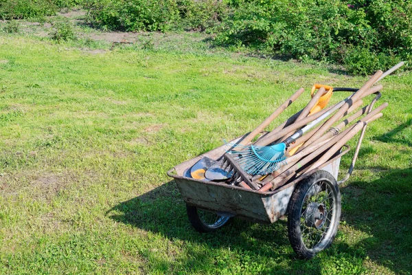 Wheelbarrow Full Garden Tools Copy Space Text — Stock Photo, Image