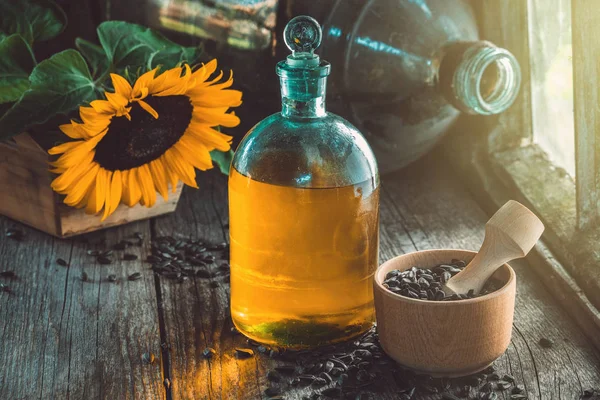 Bottle Sunflower Oil Wooden Mortar Seeds Yellow Sunflower Wooden Table — Stock Photo, Image