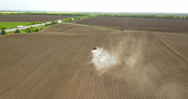 Aerial View Tractor Plowing Spring Field — Stock Video