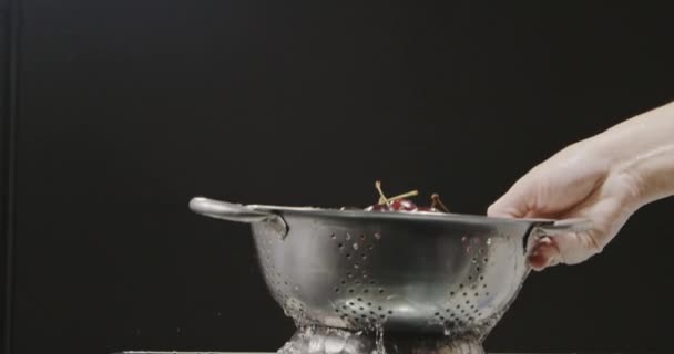 Female Hand Holding Colander Ripe Cherries Black Background Video — Stock Video