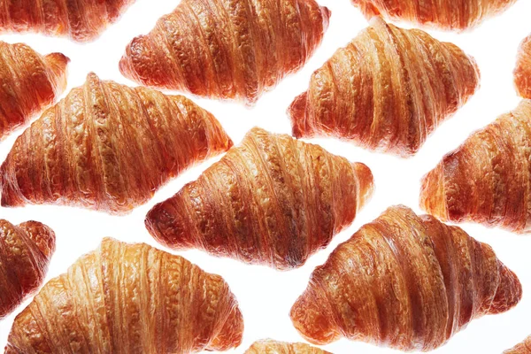 Lebensmittel Rautenmuster Aus Knusprigen Hausgemachten Französischen Croissants Auf Hellem Hintergrund — Stockfoto