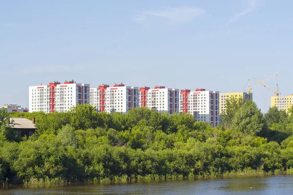 Construction of new residential districts in a part of the city over the river. Tyumen, Russia