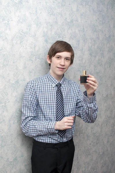 Young Russian Guy Holds Bottle Men Perfumery Water Hand — Stock Photo, Image