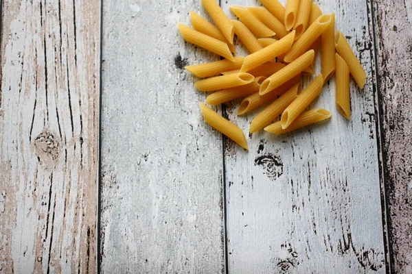 Raw Penne Pasta Rustic Table Top View — Stock Photo, Image