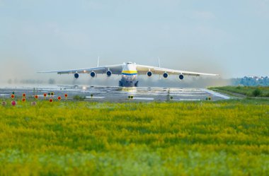 Antonov An-225 Mriya aircraft takes off from the Gostomel airport in Kyiv, Ukraine. This giant cargo plane is the heaviest aircraft ever built. Summer 2018 clipart