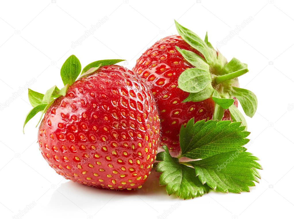 fresh red strawberries with green leaves isolated on white background