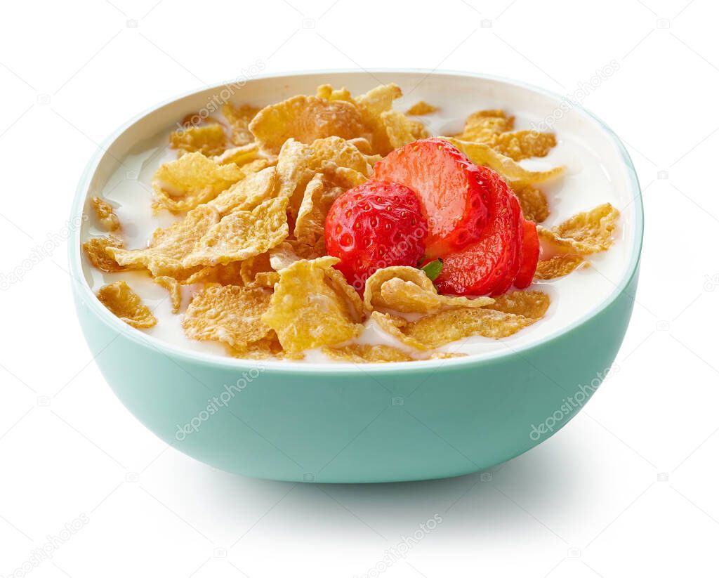 bowl of sweet cornflakes with milk and strawberries isolated on white background