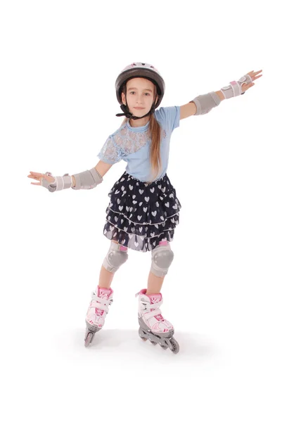 Kleines Hübsches Mädchen Auf Rollschuhen Vor Weißem Hintergrund — Stockfoto