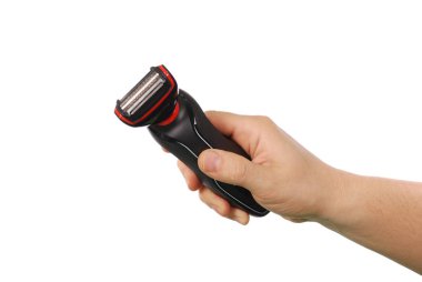 Tıraş tıraş makinesi üzerinde beyaz izole tutan güçlü erkek el