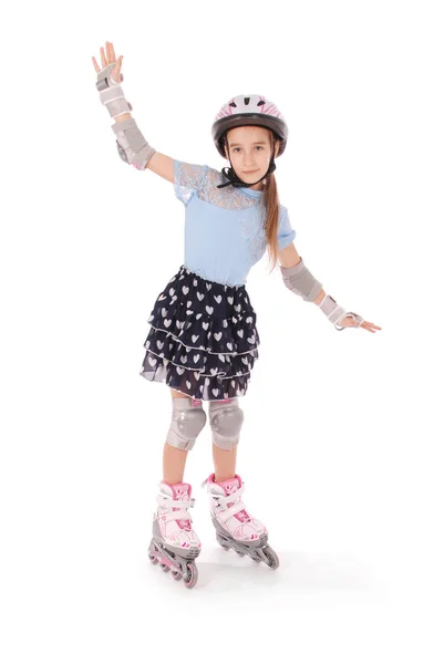 Malá Hezká Dívka Kolečkových Bruslích Proti Bílým Pozadím — Stock fotografie