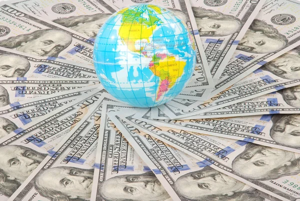 Earth globe on mandala kaleidoscope from money. Abstract money background raster pattern repeat mandala circle