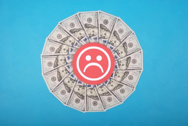 Sad smile faces on mandala kaleidoscope from money. Abstract money background raster pattern repeat mandala circle.