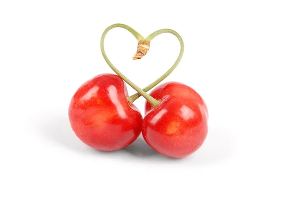 Par Søde Kirsebærfrugter Med Hjerteformet Stilk Isoleret Hvid Baggrund - Stock-foto