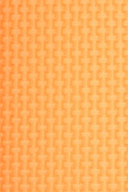 Doku bir polietilen turuncu parlaklık spor salonu mat. Yoga mat doku. 