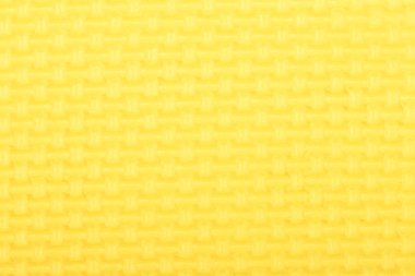 Doku bir polietilen sarı parlaklık spor salonu mat. Yoga mat doku. 