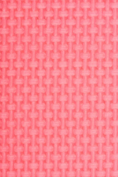 Textur einer Polyethylen-roten glänzenden Turnmatte. Textur der Yogamatte. — Stockfoto