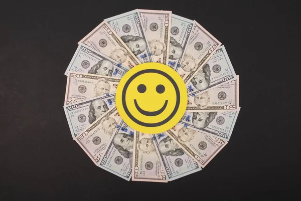 Smile faces on mandala kaleidoscope from money.