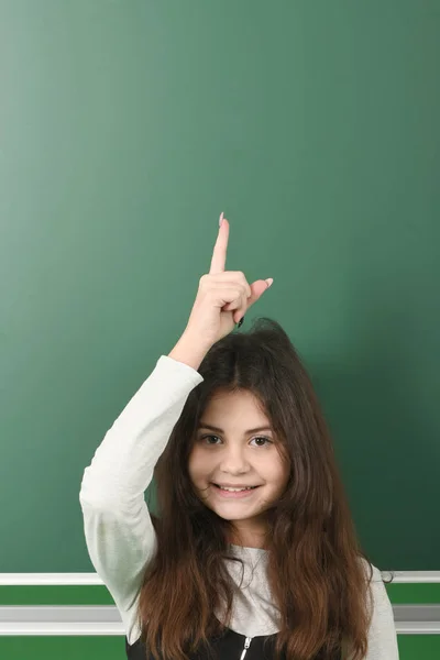 Smiling little schoolgirl — Stock Photo, Image