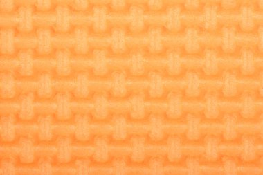 Doku bir polietilen turuncu parlaklık spor salonu mat. Yoga mat doku. 