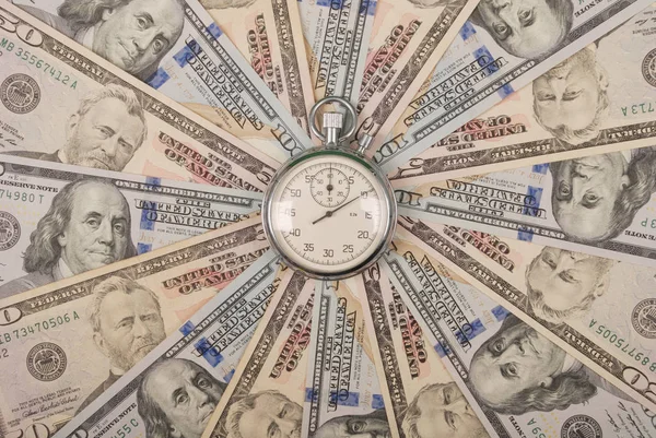 Χρονόμετρο στο Καλειδοσκόπιο μάνταλα από τα χρήματα. — Φωτογραφία Αρχείου