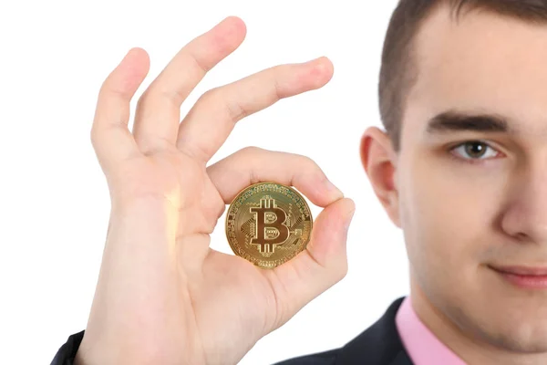 Hombre sosteniendo Bitcoin oro aislado en blanco — Foto de Stock