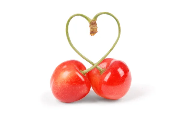 Par de frutas de cereja doce com caule em forma de coração — Fotografia de Stock
