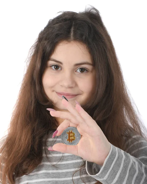 Niña sosteniendo criptomoneda — Foto de Stock