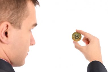 Altın Bitcoin'i beyaza yalıtan adam