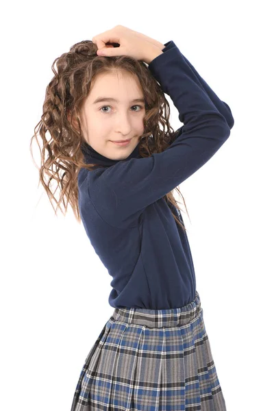 Портрет чарівної усміхненої дівчини дитячої школярки з завитими волоссям — стокове фото
