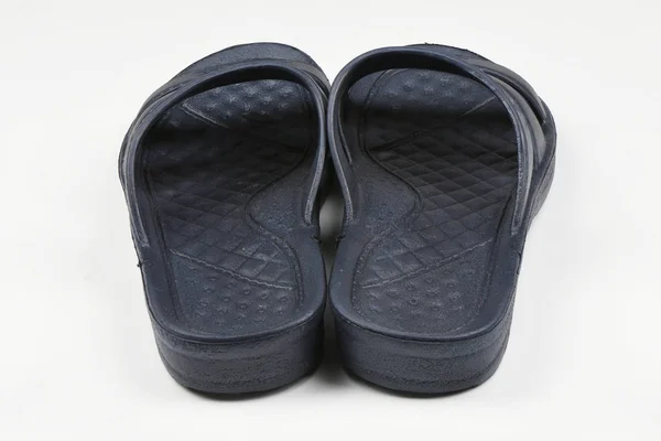 Zapatillas de goma. Par de chanclas azules aisladas en un blanco . —  Fotos de Stock