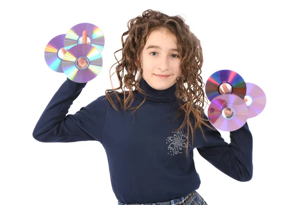 一个年轻的女学生卷曲的头发拿着CD或dvd. — 图库照片