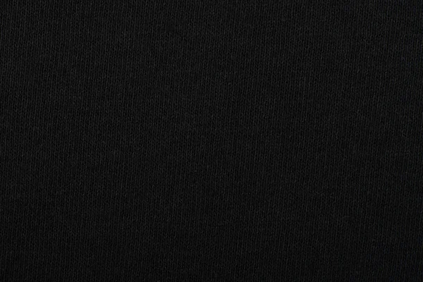 Black jersey fabric texture background.