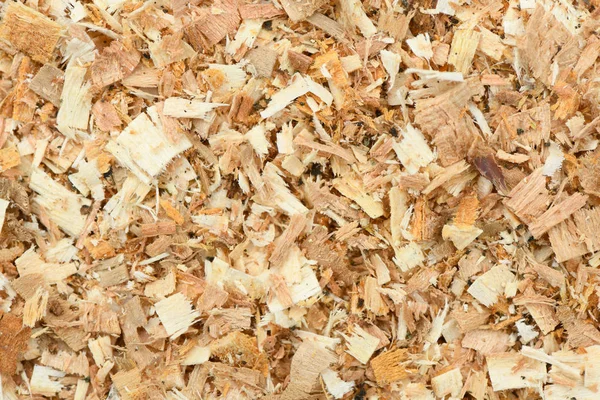 Uma camada recém-colocada de Woodchips de casca de jardim grande. Woodchips usado como superfície macia segura em um parque infantil, Top Down View . — Fotografia de Stock