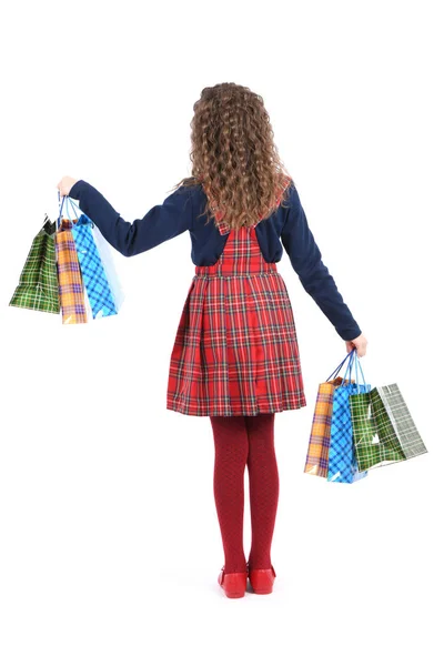 Gyermek csomagolási kockás textúra izolált fehér alapon. Lány szeret vásárolni az eladási szezonban. Ünnepi ajándék, vásárlás. — Stock Fotó