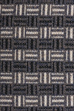 Örgü yün kahverengisinin dokusu. Geçmişi. Yüksek çözünürlüklü. Tam alan derinliği.