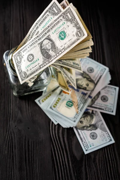Dollari Americani Vaso Vetro Uno Sfondo Legno — Foto Stock