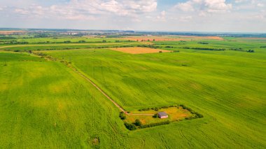 Yeşil alan gün batımında İHA ile çekilecek.