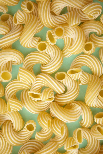 Ellow Background Pasta Form Tubes Spun Spiral — Stock Photo, Image