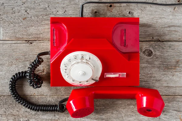 Teléfono Vintage Rojo Con Esfera Giratoria Fondo Madera Vista Superior —  Fotos de Stock