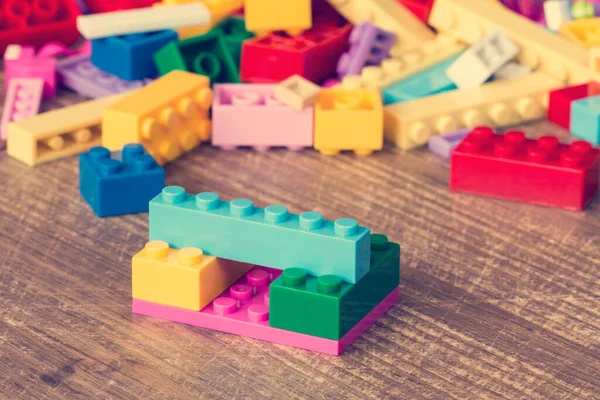 Colored Toy Bricks Wooden Surface — Stock Photo, Image