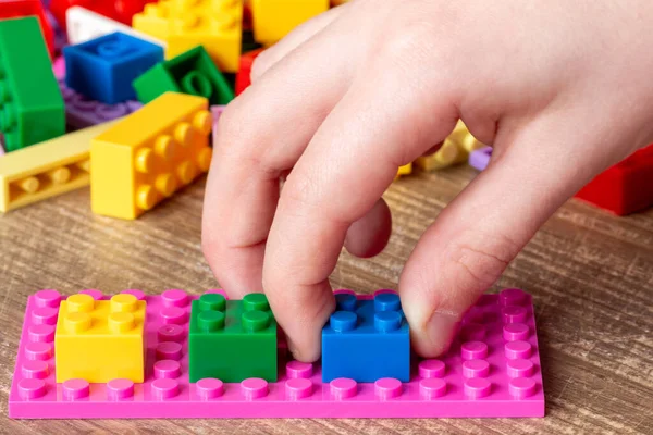 Child Playing Colored Toy Bricks — Stock Photo, Image