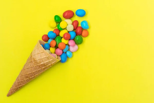 Waffle Horn Colored Candy Yellow Background — Stock Photo, Image