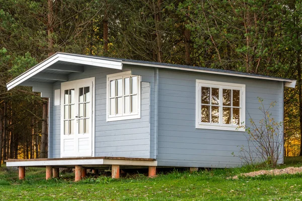 Ecological Small wooden house. Beautiful modern wooden house.