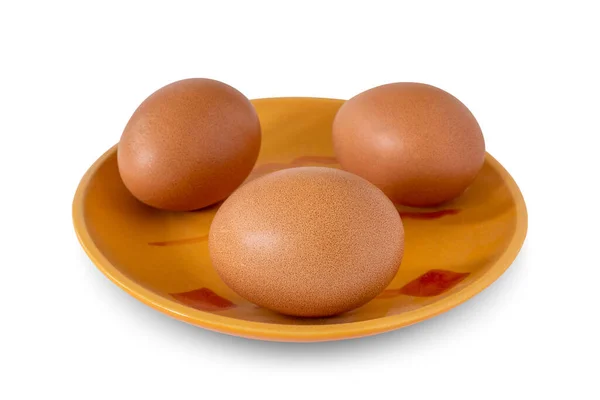 Tre Bruna Hönsägg Ligger Tallrik Vit Bakgrund Ingredienser För Bakning — Stockfoto