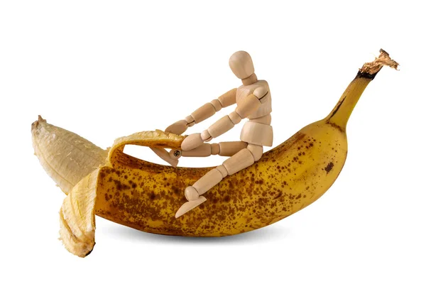 Wooden Doll Peeling Banana Isolated White Background — Stock Photo, Image